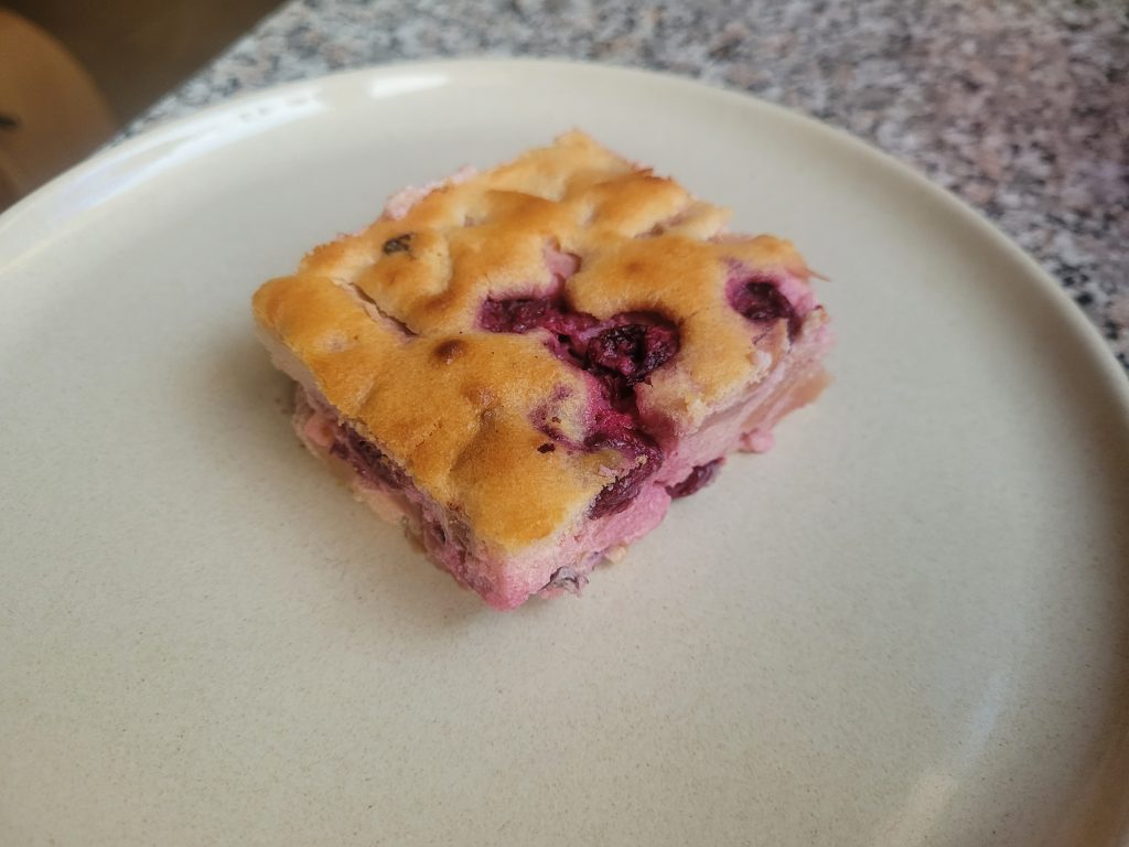 slice of apple cranberry greek yogurt cheesecake