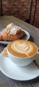 Cup of coffee with latte art on a table