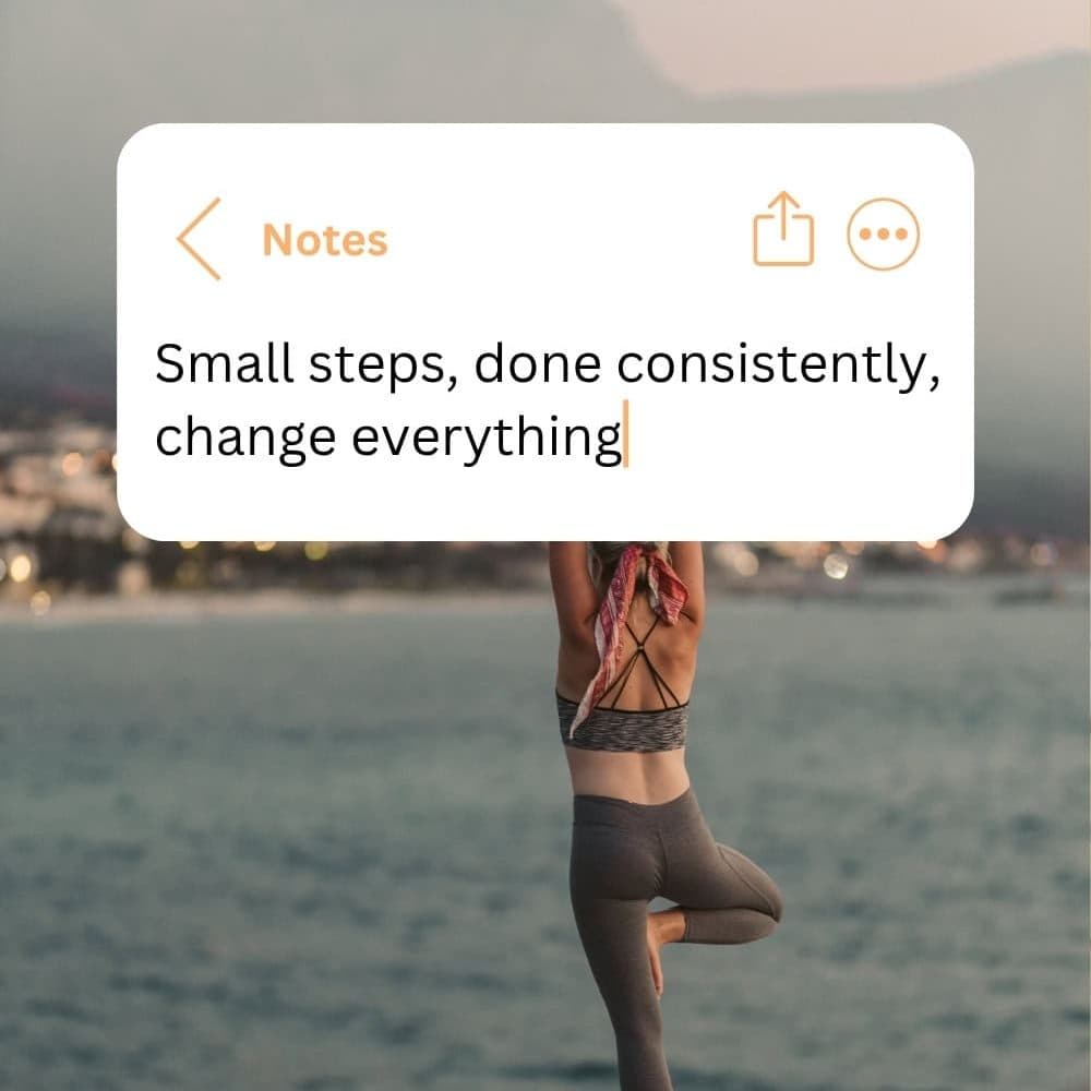 Woman practicing yoga on a rock by the w