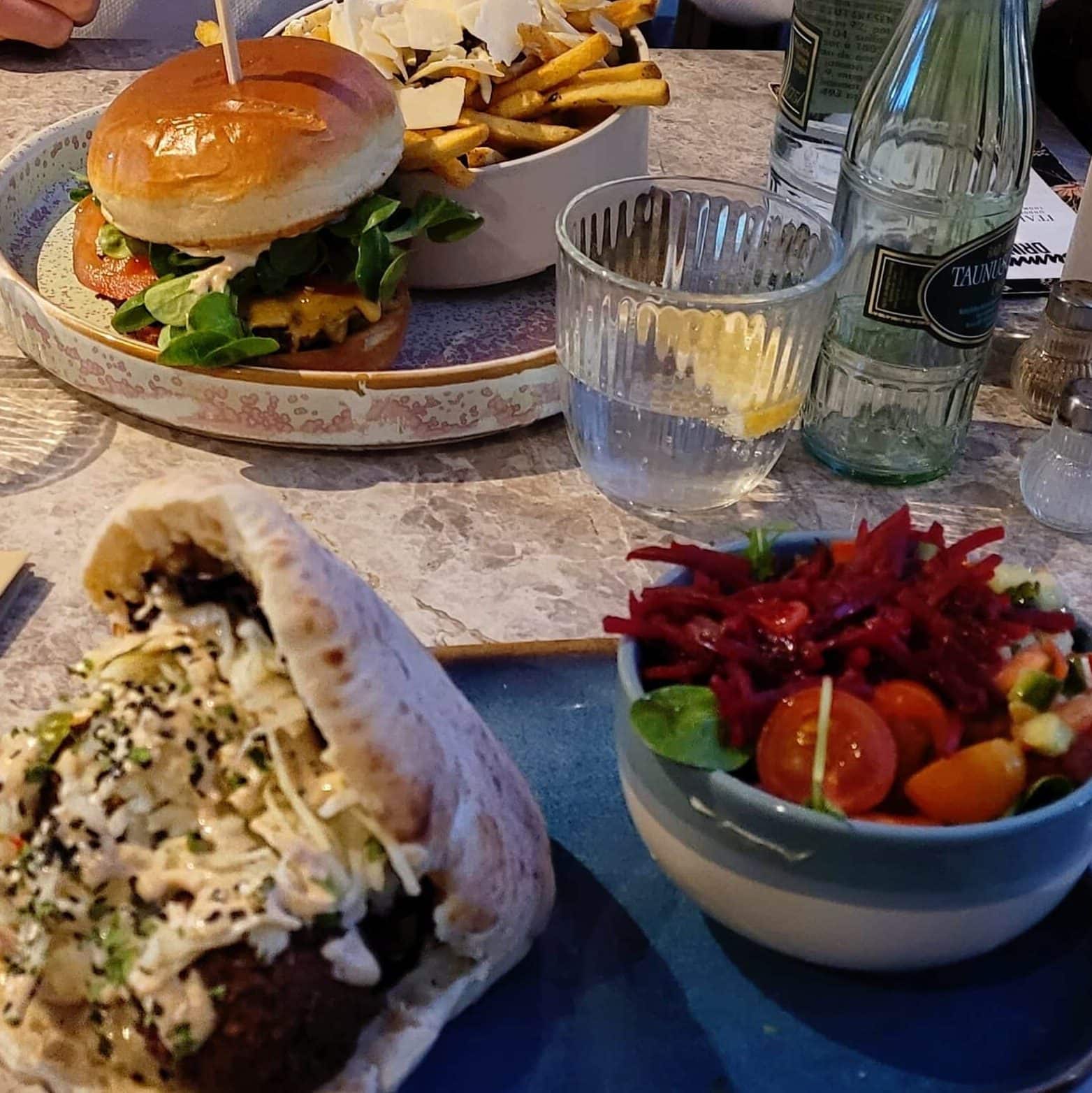 vegetarian doner wrap with vegetables and side salad filling healthy meal