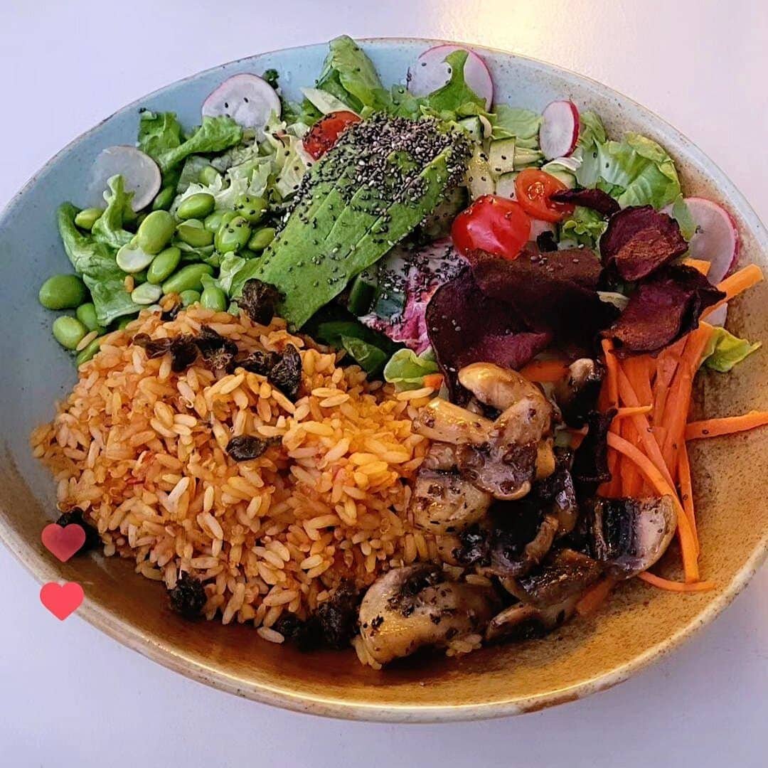 healthy balanced bowl with rice avocado vegetables and protein colorful meal