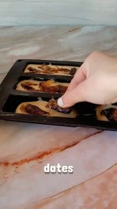 Date placed on top of easy Homemade Protein Bars