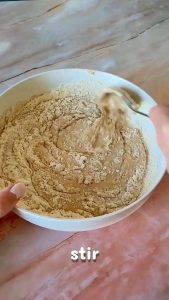 stired ingredients of Homemade Protein Bars together in a bowl