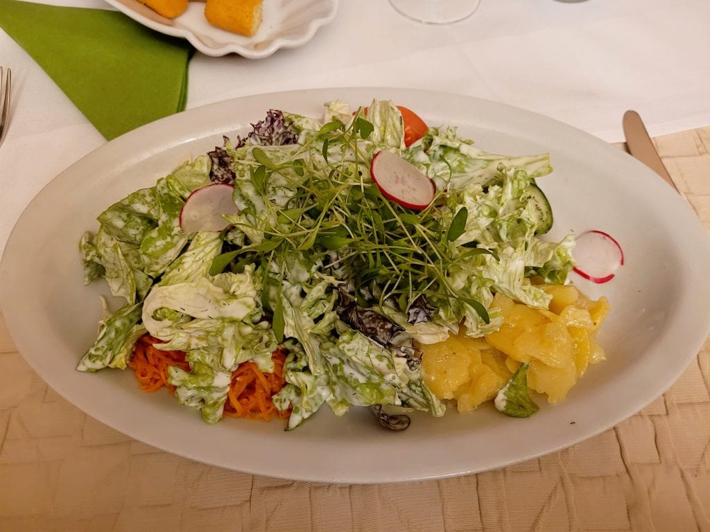 mixed salad with greens fruit and fresh ingredients colorful healthy restaurant meal