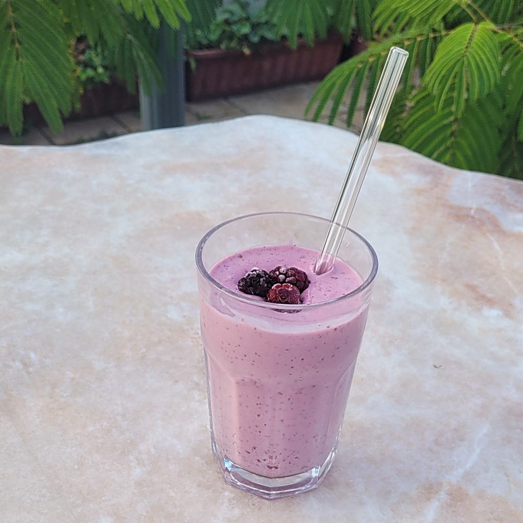 Refreshing raspberry protein shake made with Greek yogurt and berries