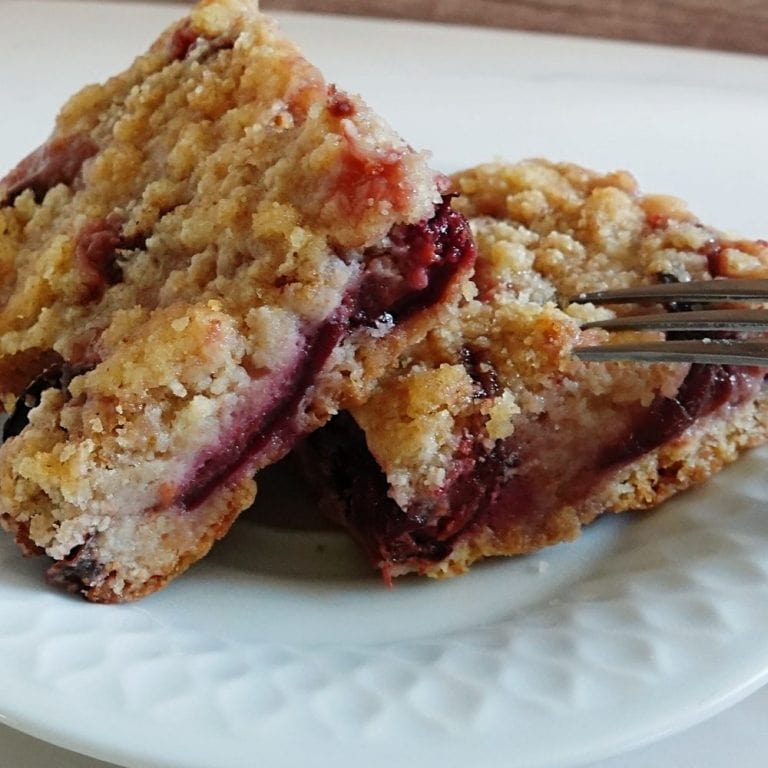 Delicious homemade strawberry jam bars with crumbly topping and fruity filling.