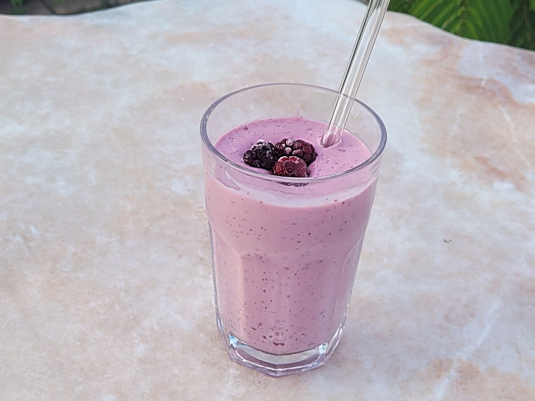 Berry protein yogurt bowl idea with raspberries and blackberries.