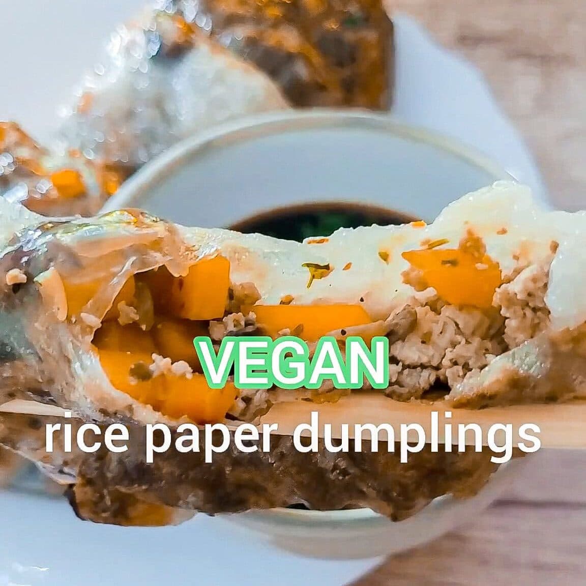 Vegan rice paper dumplings filled with vegetables and tofu on a plate.
