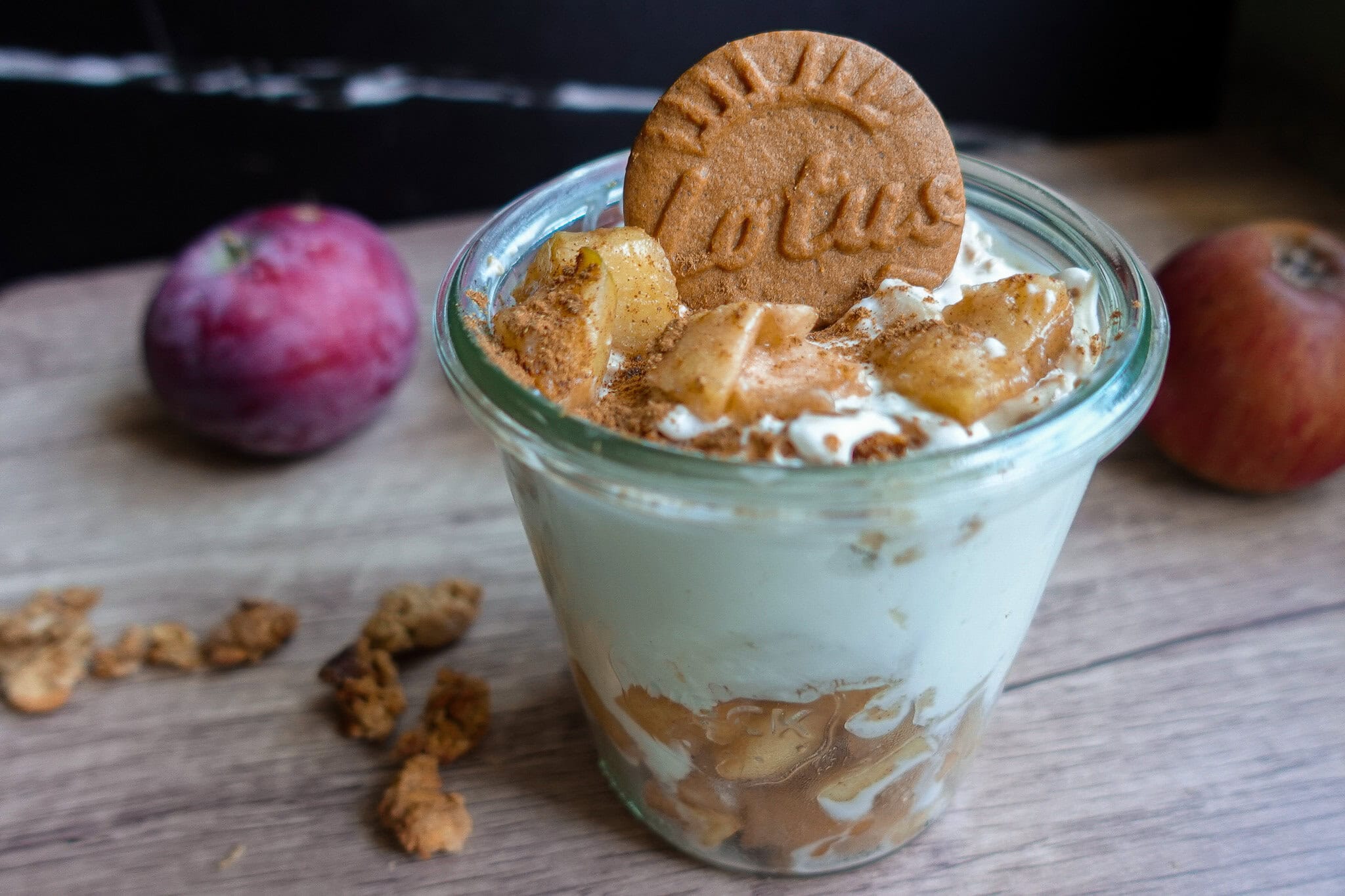 Delicious apple pie yogurt parfait with cookies and granola for a healthy snack.